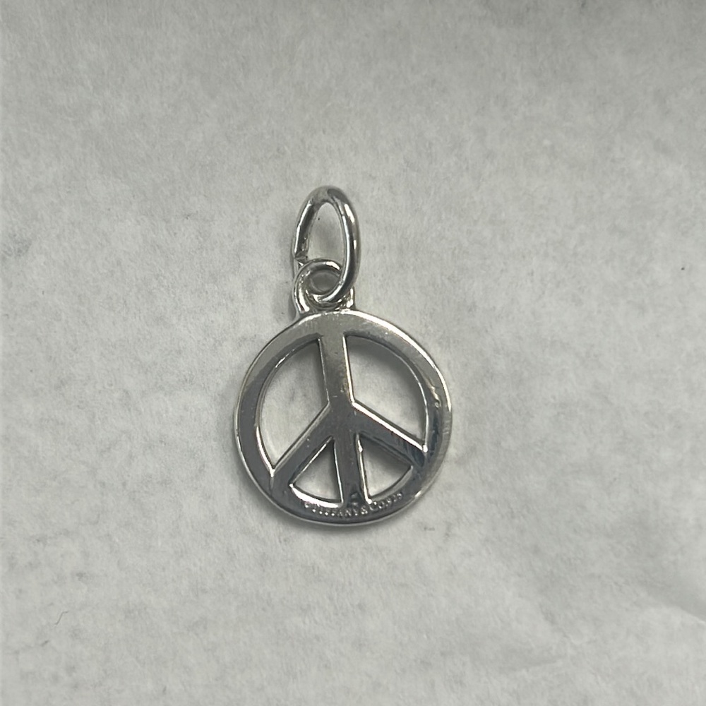 Tiffany & Co. 925 sterling silver peace sign charm